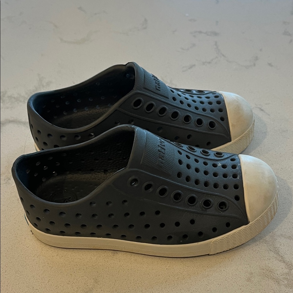 Native Black Slip-On Perforated Shoes with White Toe Caps